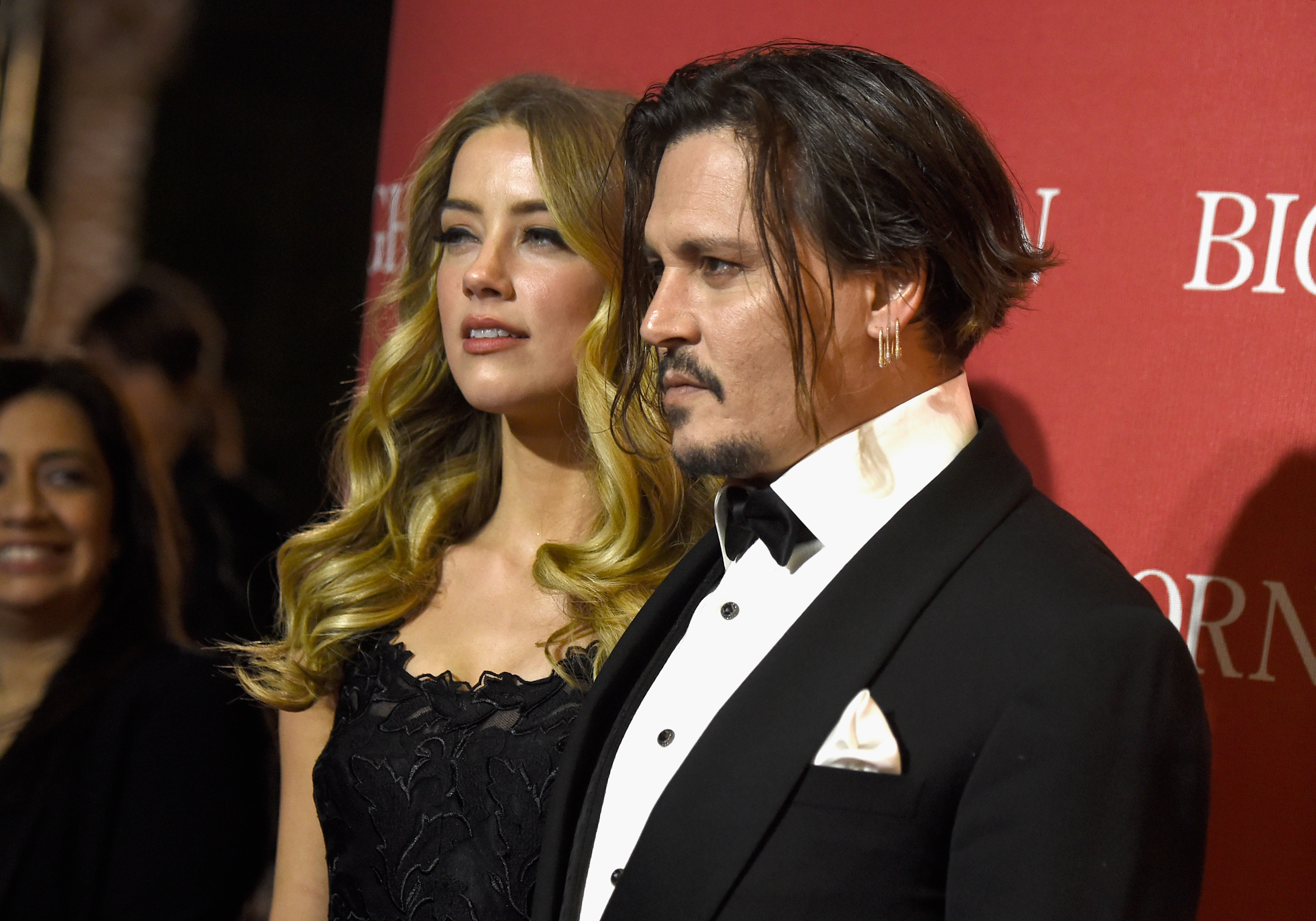 PALM SPRINGS, CA - JANUARY 02:  Actors Amber Heard (L) and Johnny Depp attend the 27th Annual Palm Springs International Film Festival Awards Gala at Palm Springs Convention Center on January 2, 2016 in Palm Springs, California.  (Photo by Frazer Harrison/Getty Images)