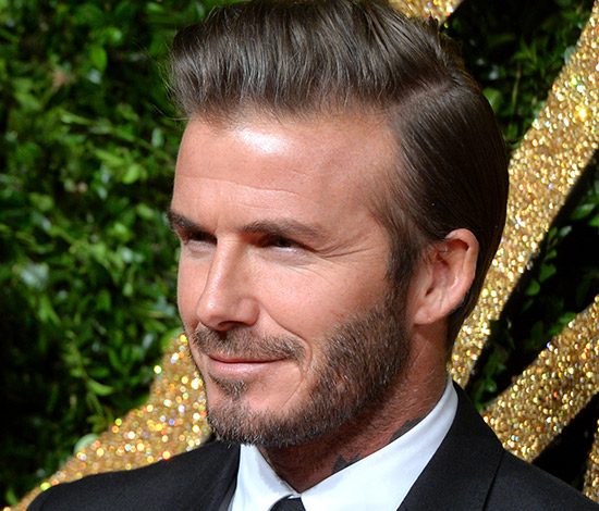 Дэвид Бекхэм флиртует с неизвестной брюнеткой