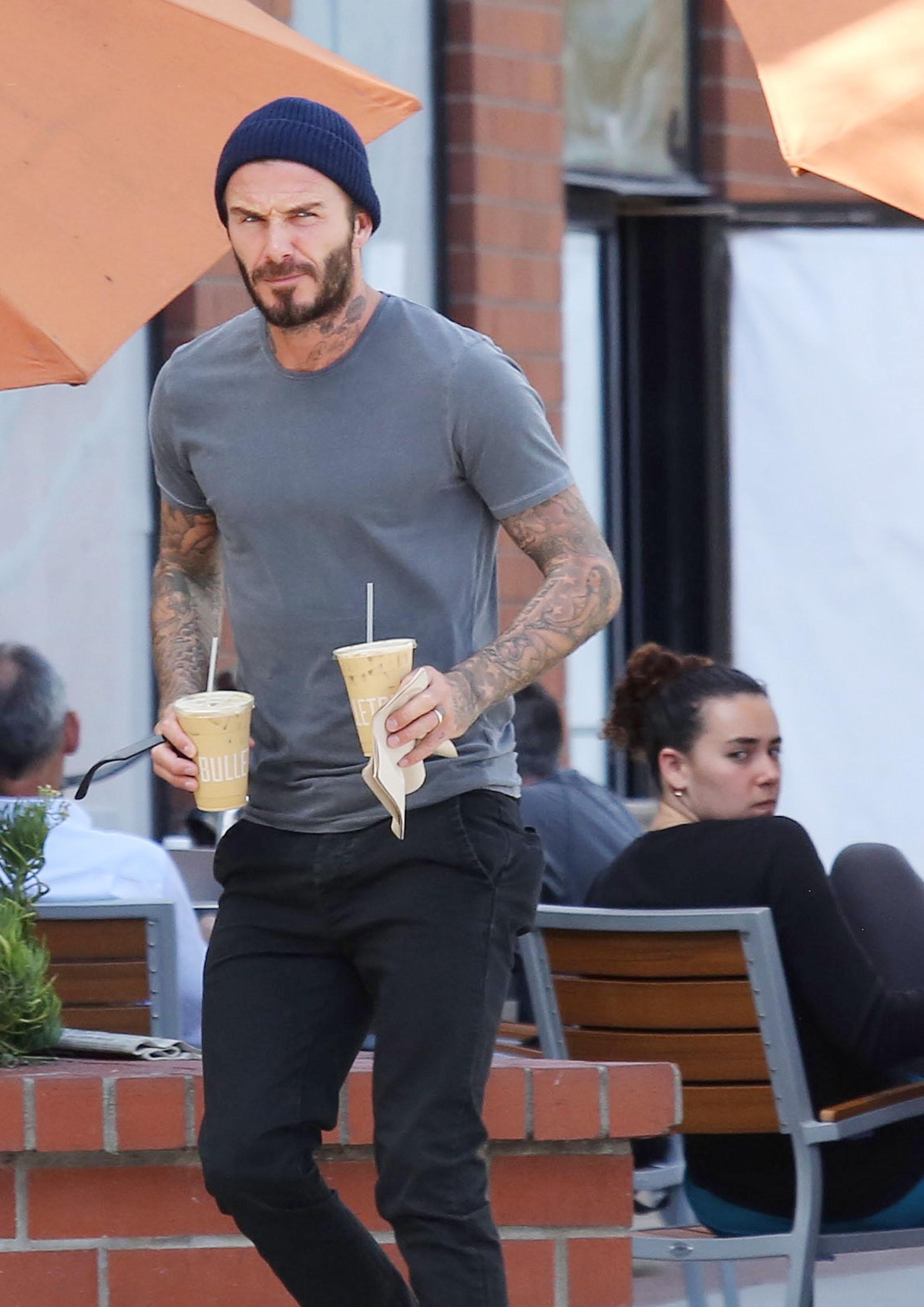 *EXCLUSIVE* David Beckham struggles to keep his eyes off a Californian blonde beauty!