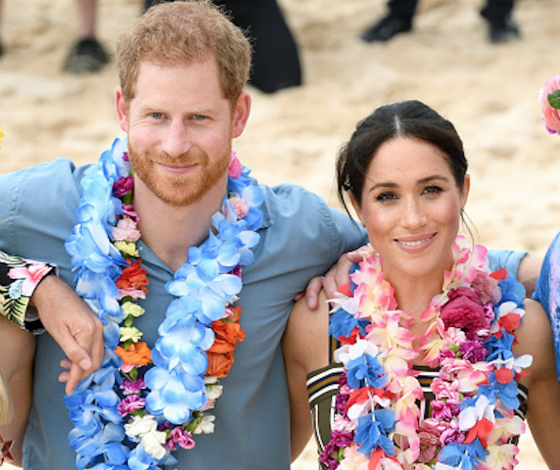 Тусовка с серферами и официальный визит в школу: как прошёл день Меган Маркл и принца Гарри?