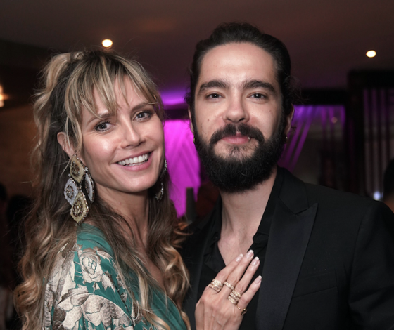 Она светится! Хайди Клум и Том Каулитц на выставке в Гонконге