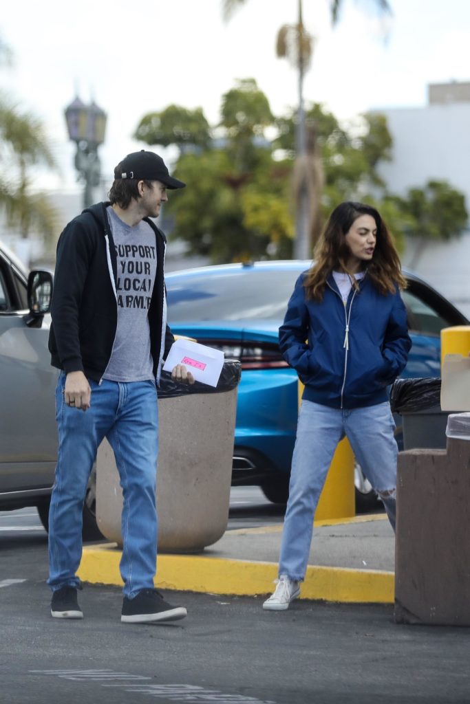 *EXCLUSIVE* Ashton Kutcher and Mila Kunis keep each other company at the DMV in LA