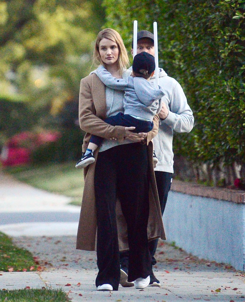 EXCLUSIVE: Rosie Huntington-Whiteley and Jason Statham Take a Family Stroll in Los Angeles.