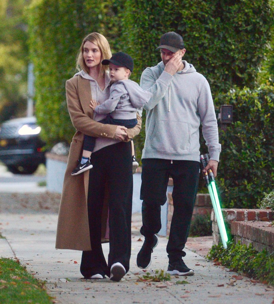 EXCLUSIVE: Rosie Huntington-Whiteley and Jason Statham Take a Family Stroll in Los Angeles.