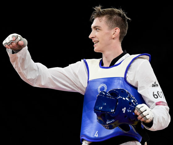 Скандалы Олимпиады 2021: победа со сломанной рукой, тайфун, допинг и коронавирус