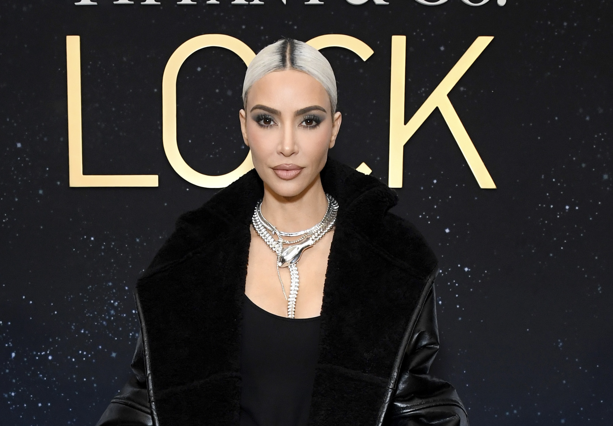 The skin everyone lives in: Kim Kardashian proves that the oversized sheepskin coat has been a definite trend for a long time