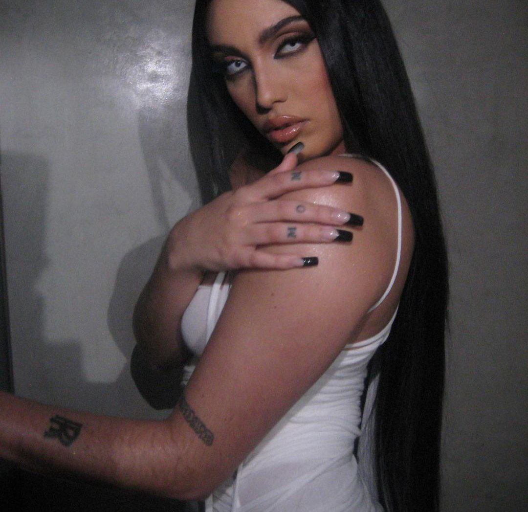 It’s all in the mother: Madonna’s daughter poses in a transparent dress