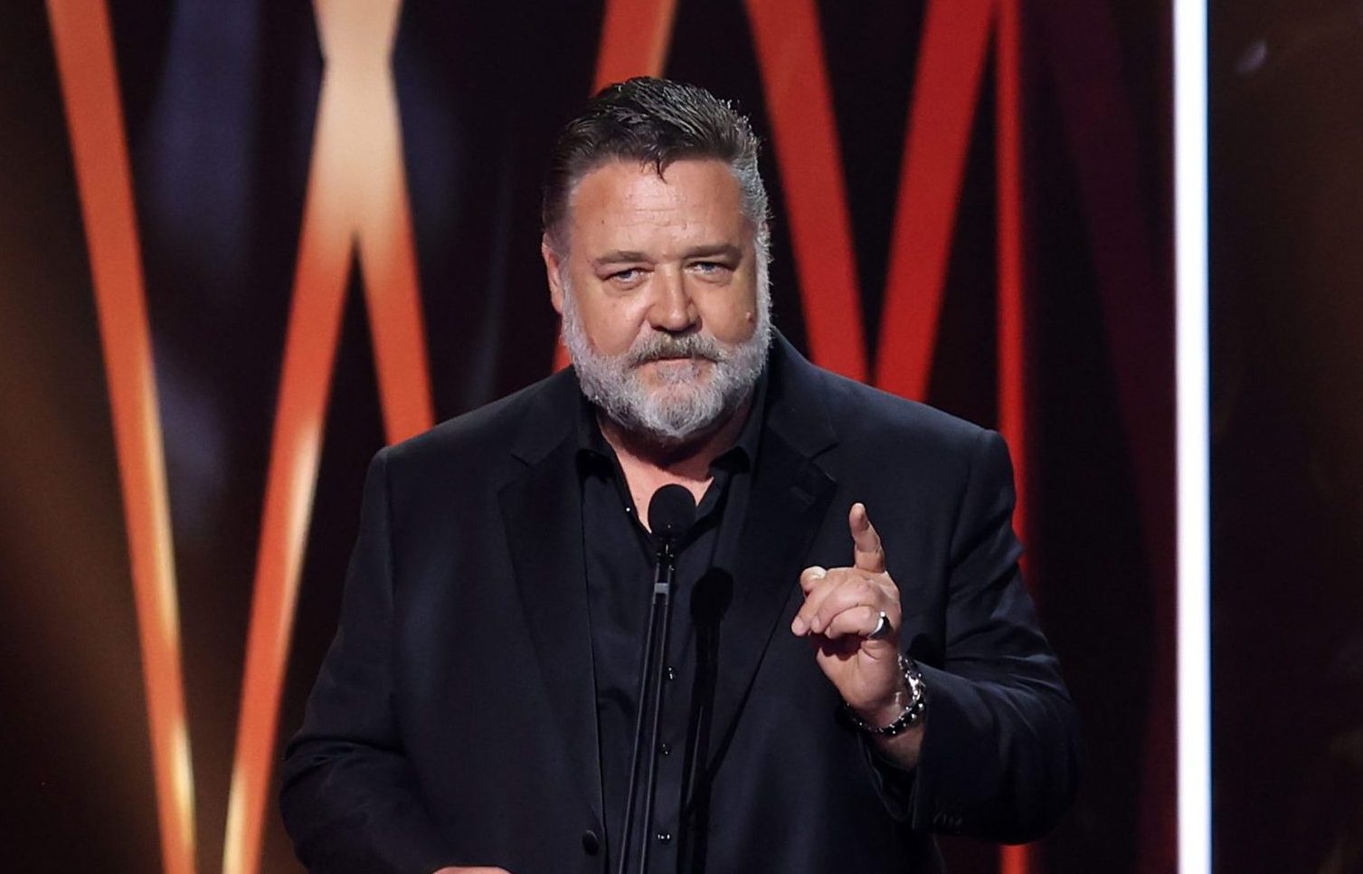 Russell Crowe leaves show after fight breaks out between team and fans