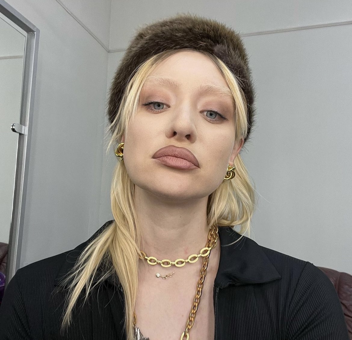 Maria Minogarova tried on a magnificent dress with many cutouts.  right, there is one