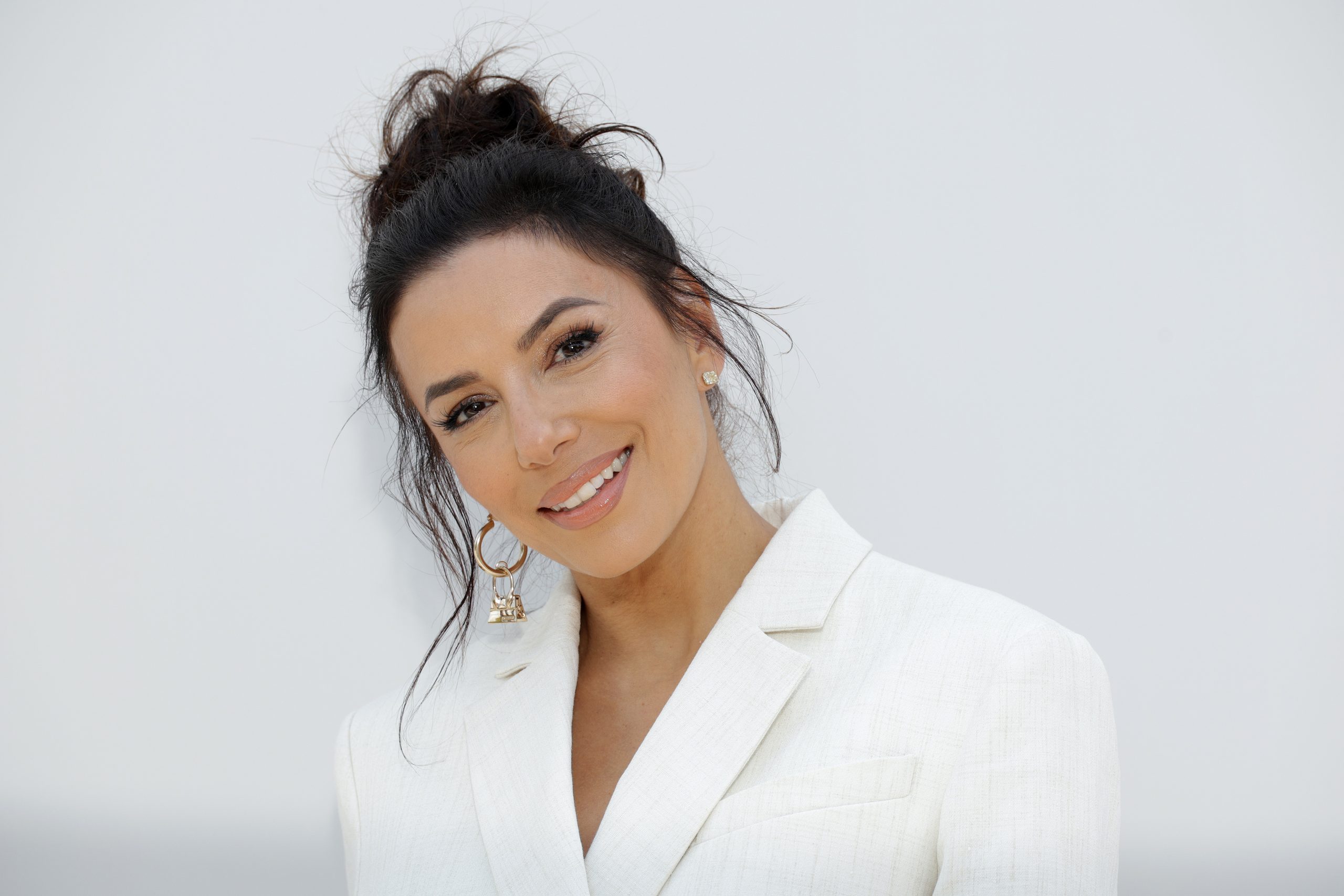 Public domain: Eva Longoria proves cut dresses are 100% on trend of the season