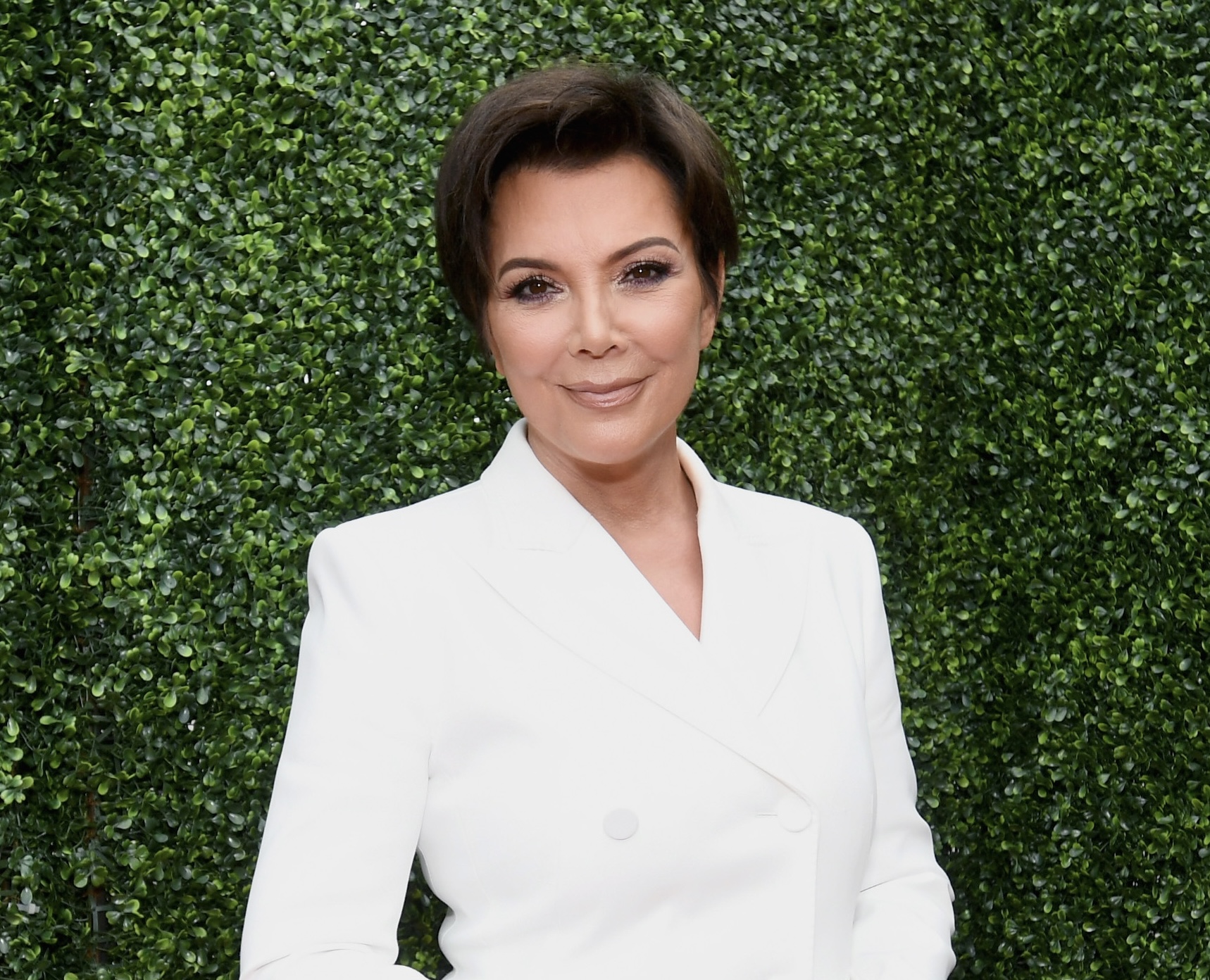Kris Jenner tried on an elegant white dress