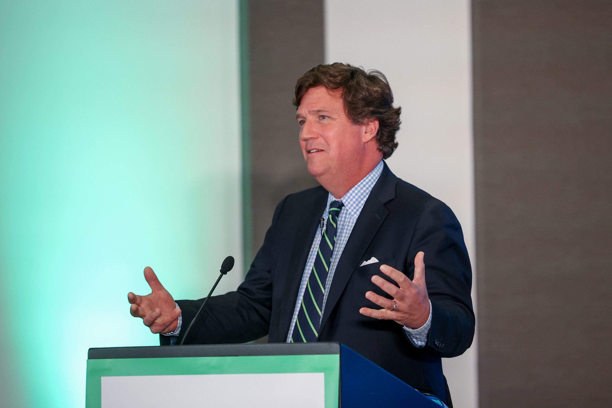 After the interview with Vladimir Putin was revealed: What is Tucker Carlson known for?