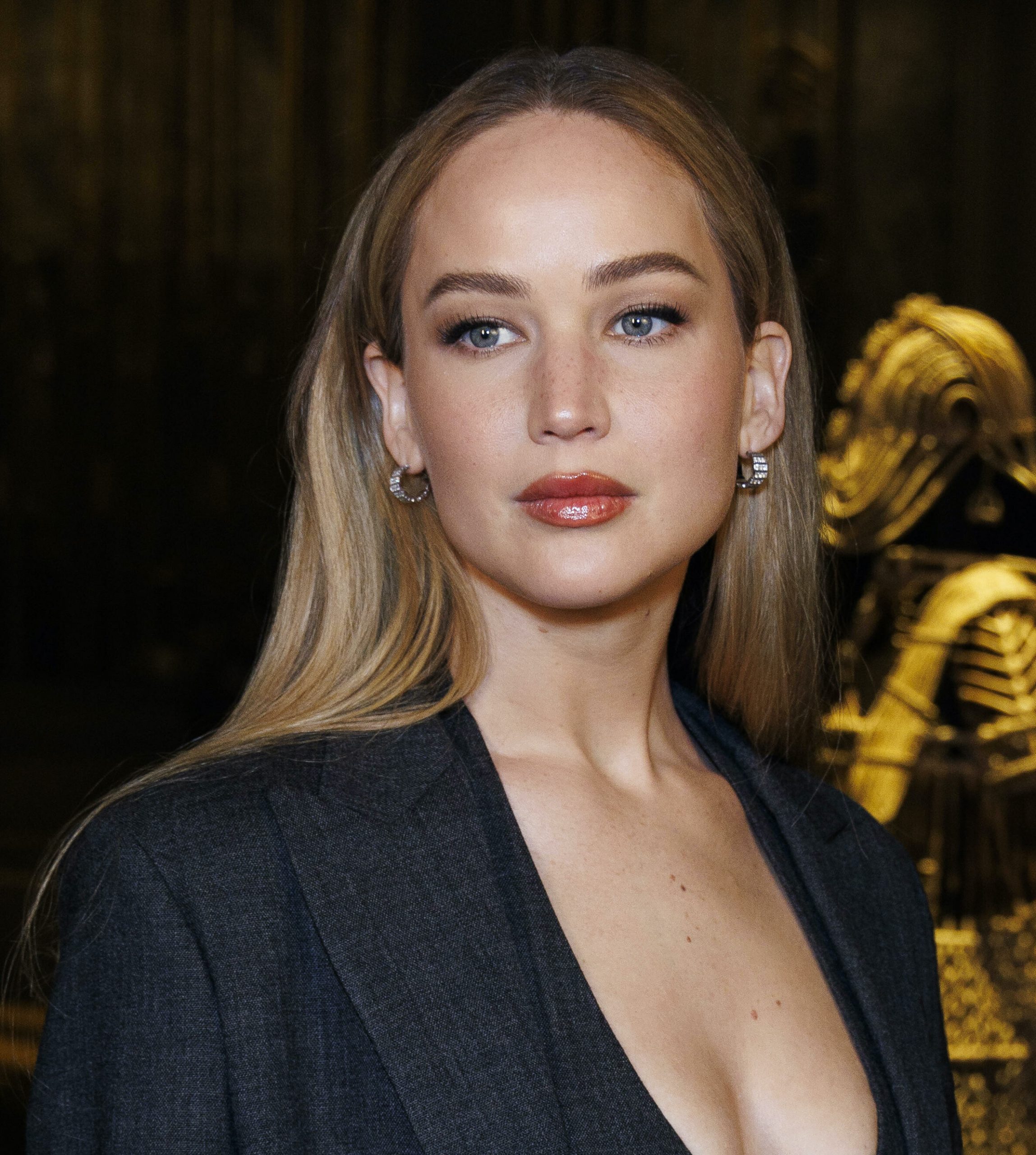 Jennifer Lawrence proves that wearing a three-piece suit over a naked body is the sexiest stylistic move