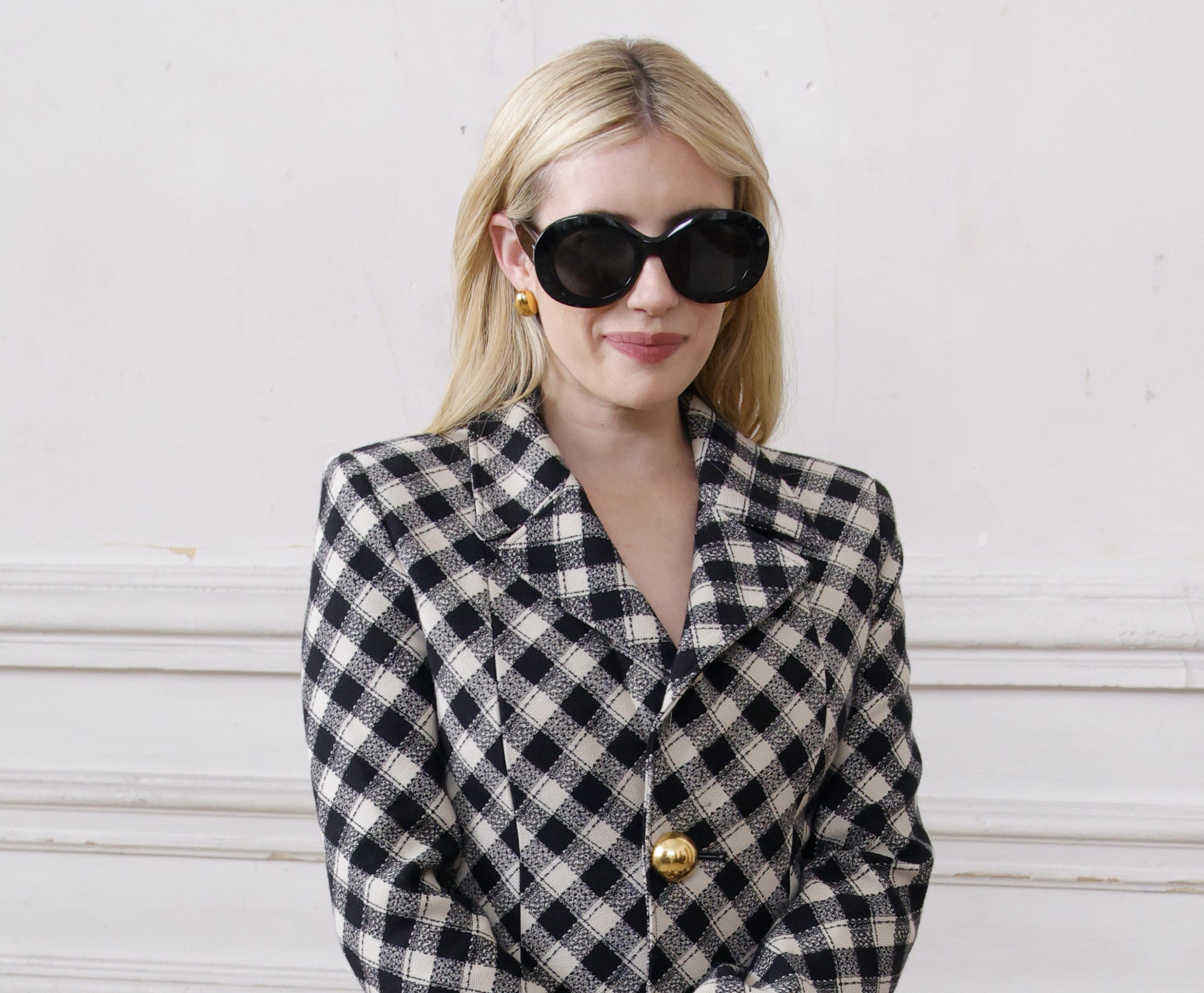 Emma Roberts shows how to wear a jacket instead of a dress.  And we will definitely consider this technique
