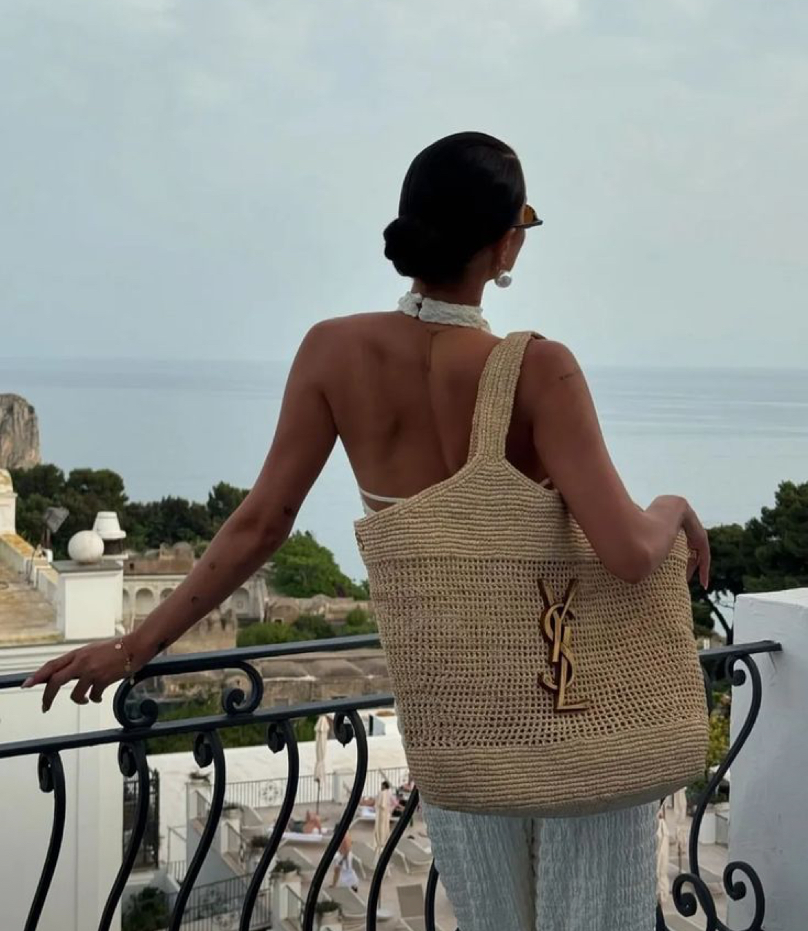 You definitely need this bag this summer. See how Angelina Jolie wears it