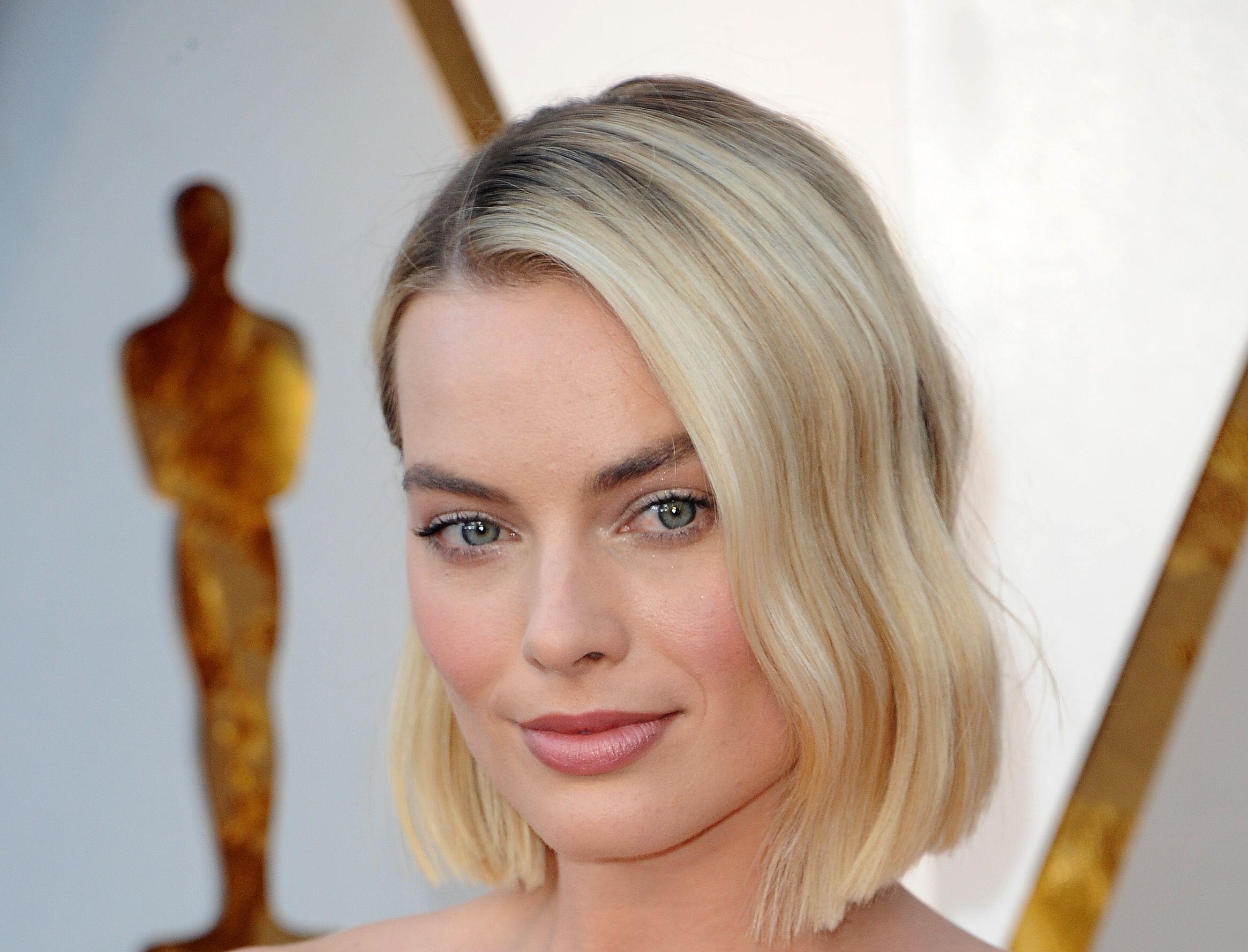Margot Robbie was seen walking with her newborn son for the first time since his birth.