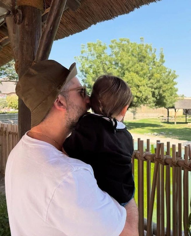 Bader Shammas with his son. Photo: Social Networks