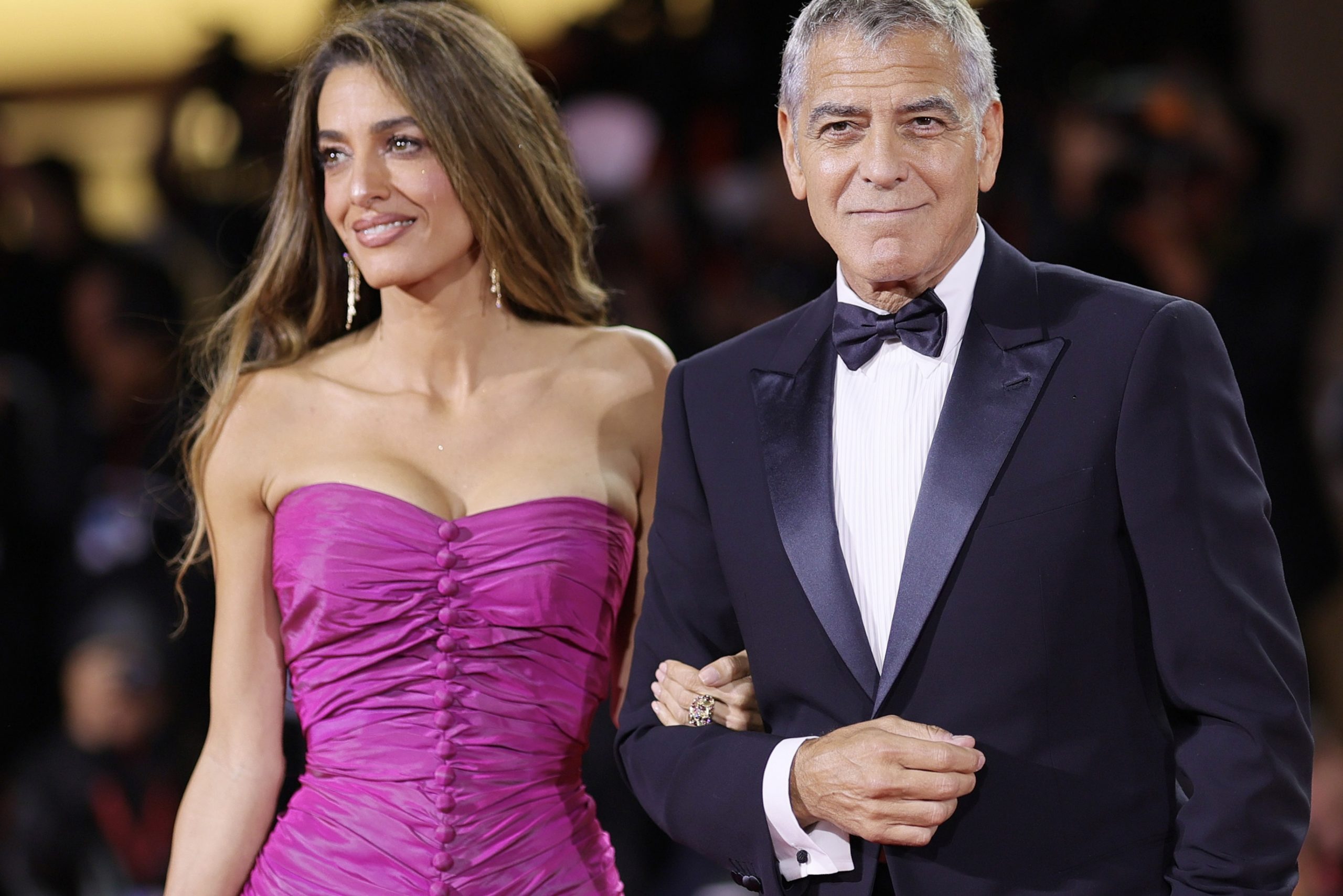 Amal Clooney in a Fuchsia mini dress claims the best image of “Venice Film Festival-2025”