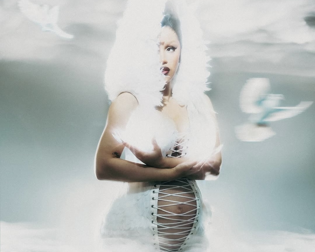 Cardi B flaunted a dress by Russian designer Ilya Migmun during the Paper Magazine shoot